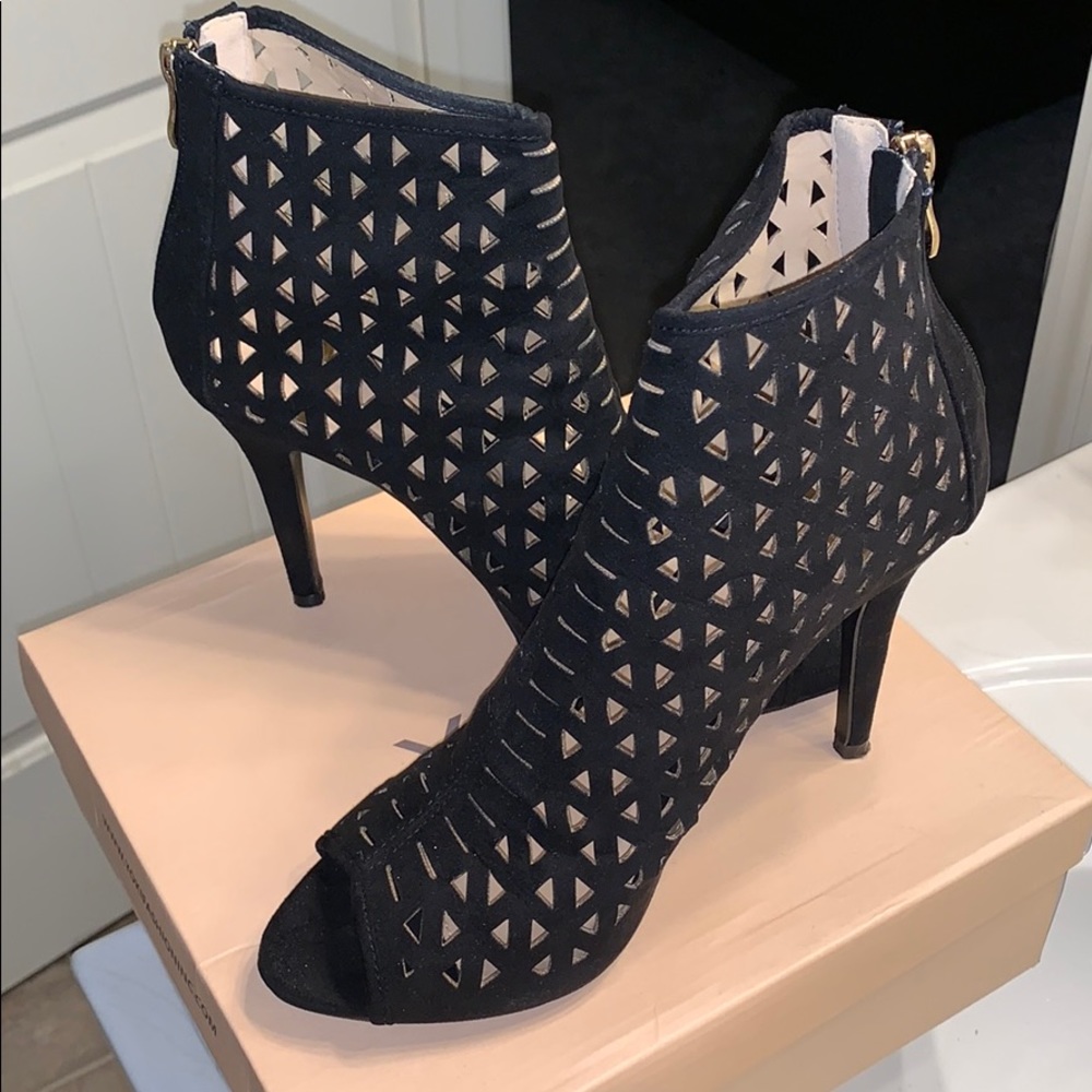 Women’s peep toe sandals/heels.